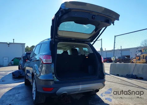 2016 Ford Escape Titanium из США, поврежденный, VIN 1FMCU9J93GUB27603